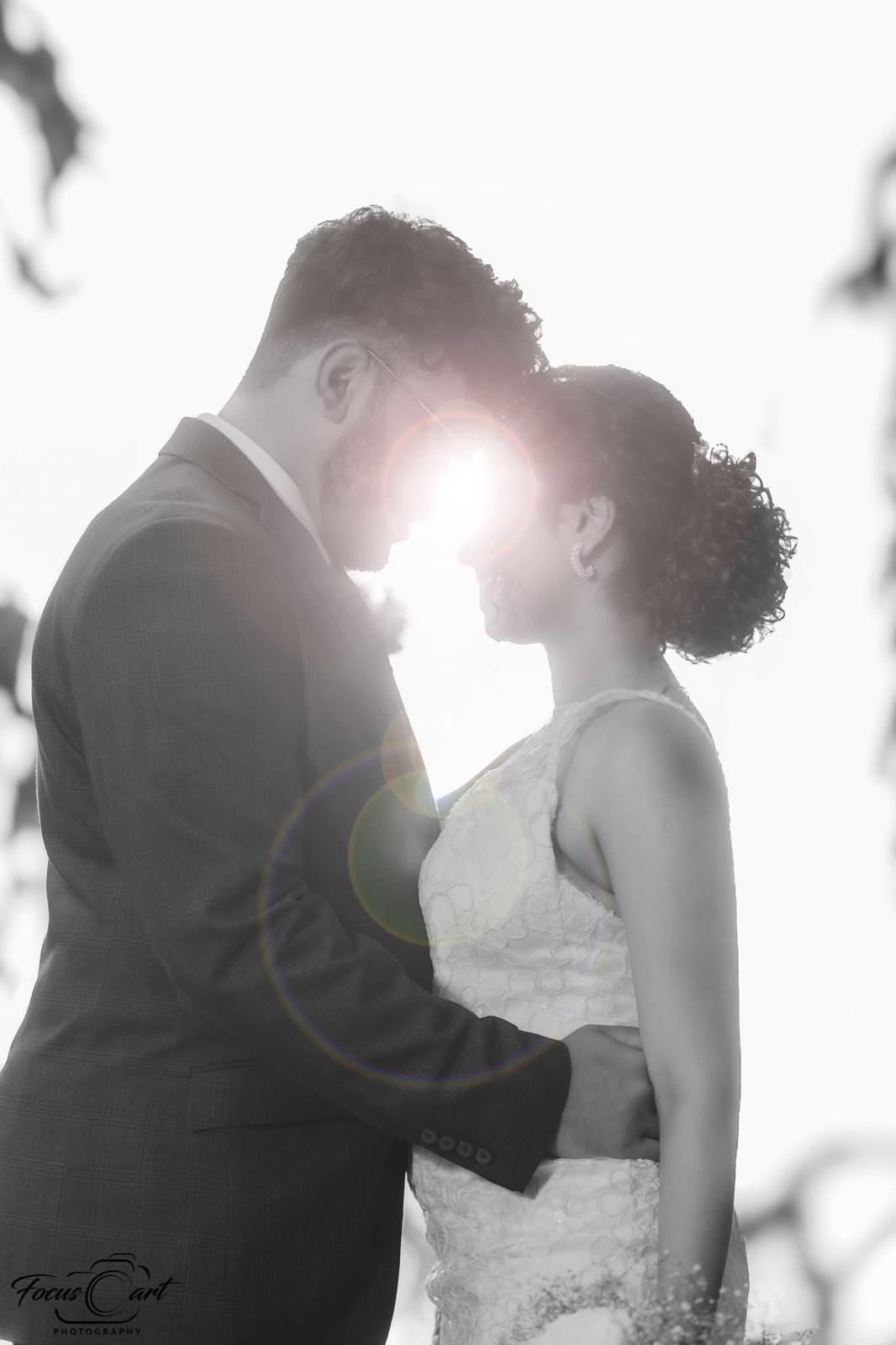 Couple silhouette in bright lens flare
